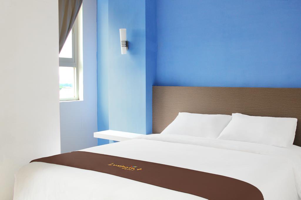 Luxpoint Hotel Baratajaya Sorabaya Chambre photo
